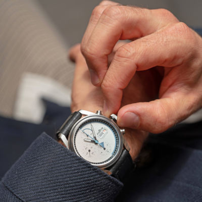 Close up of a man adjusting his wrist watch